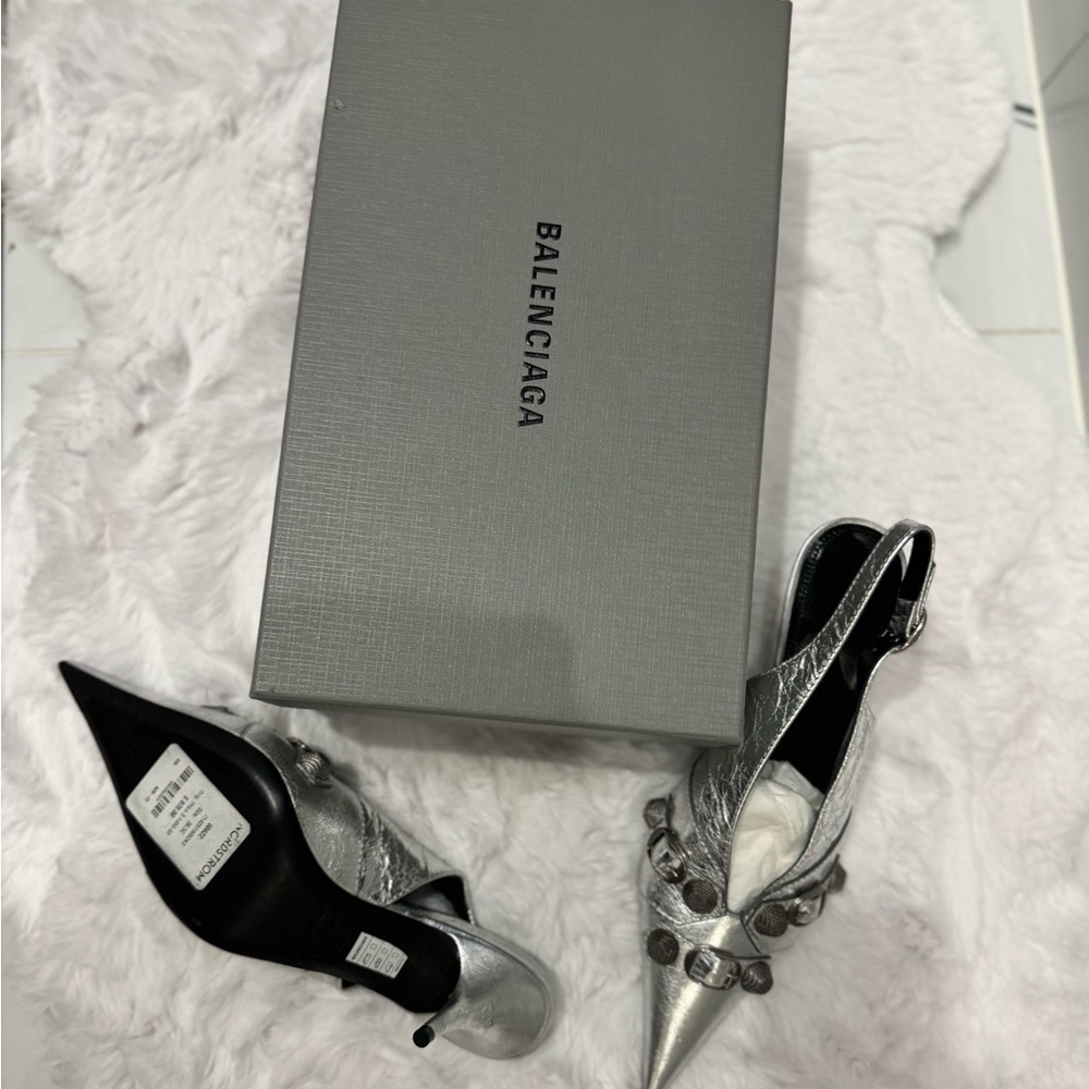 Balenciaga Cagole pointed toe slingback sandal in silver color.